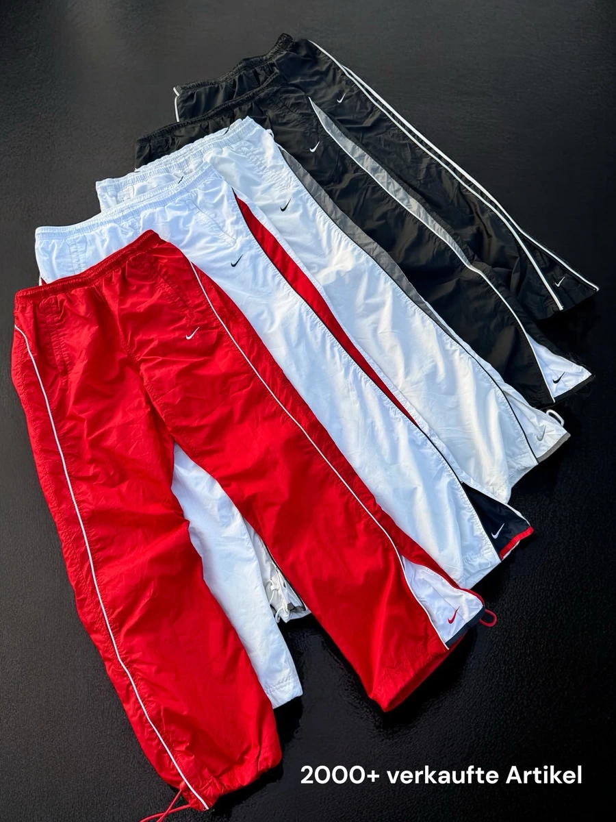 Dripzone-Auswahl mit roten, weißen und schwarzen Trackpants – 2000+ verkaufte Artikel